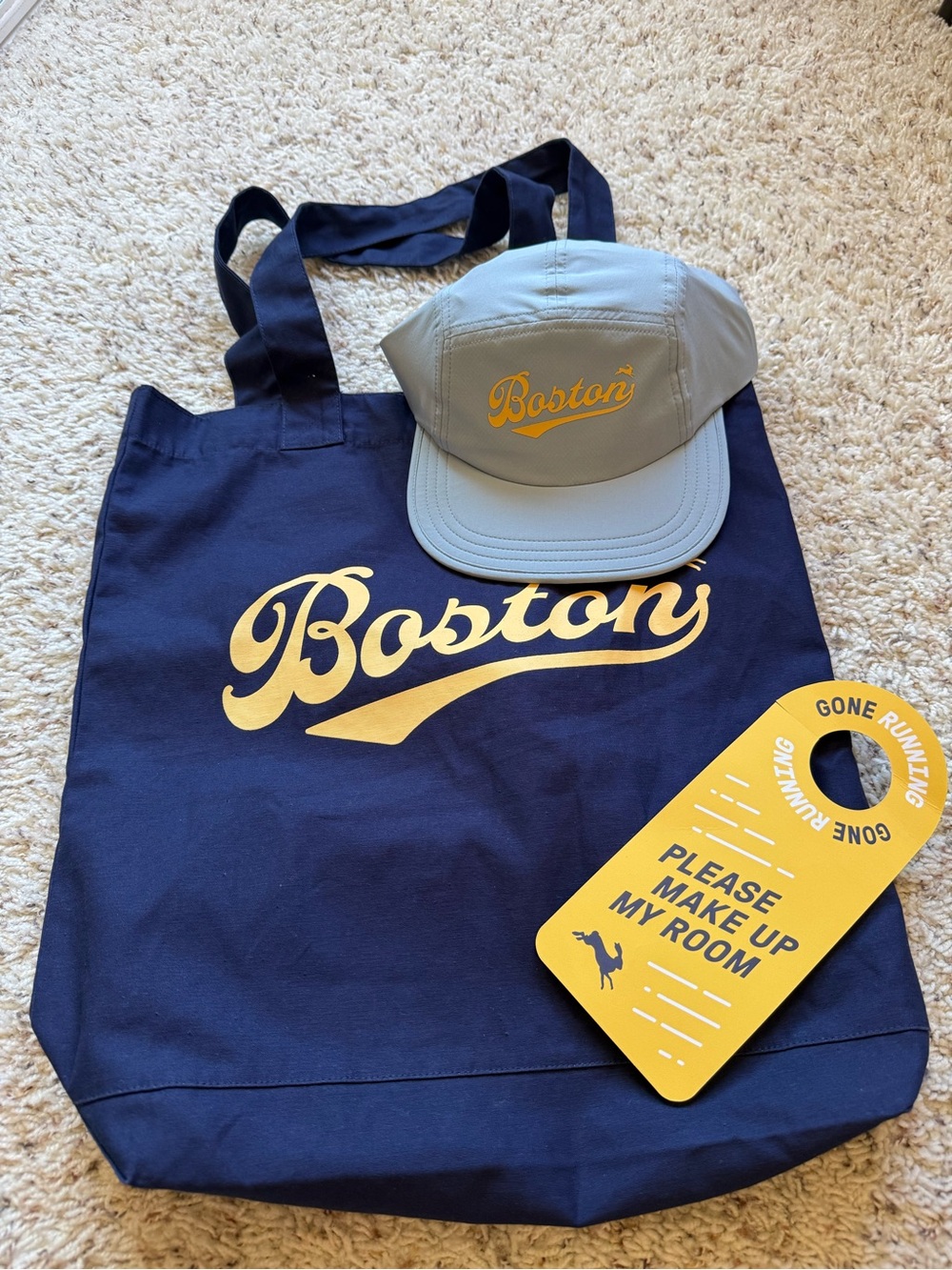 Tracksmith 2026 Boston Marathon race pack - hat and tote